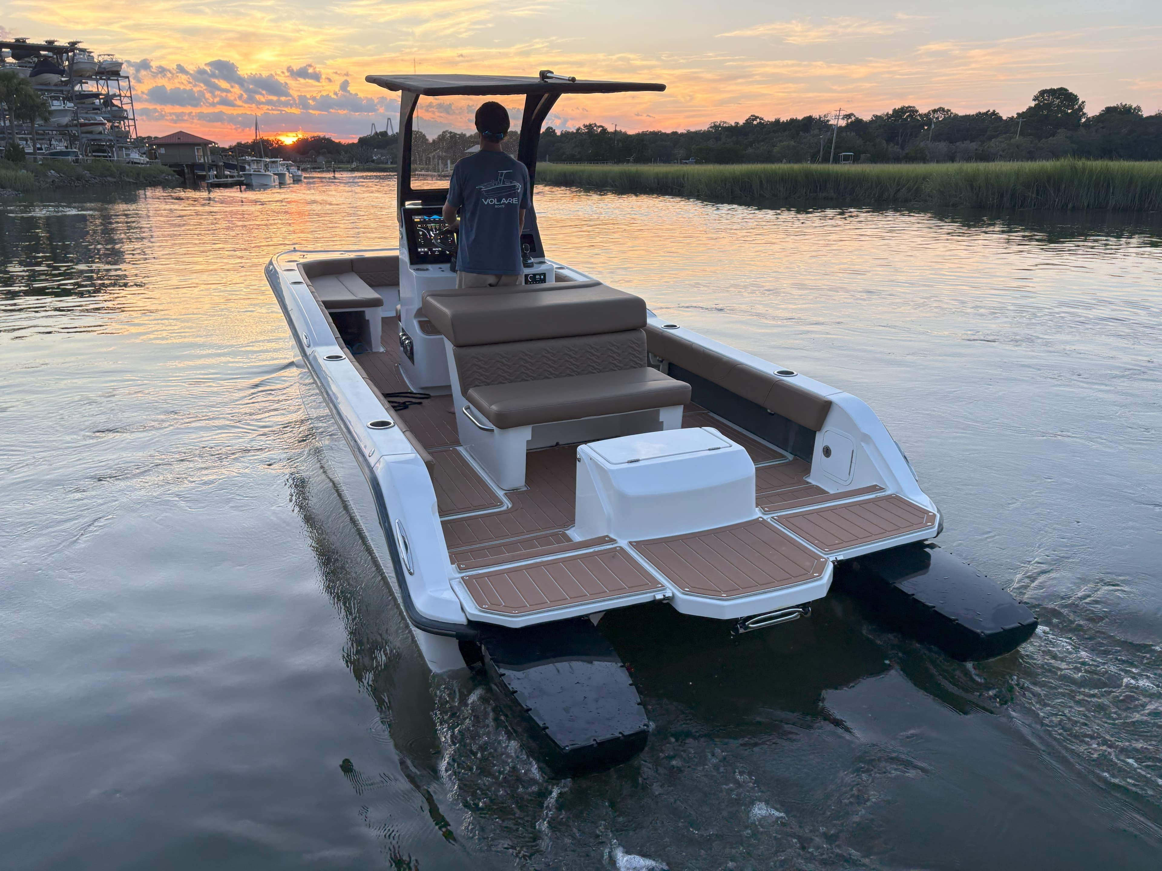 Electric marine vessel at sunset